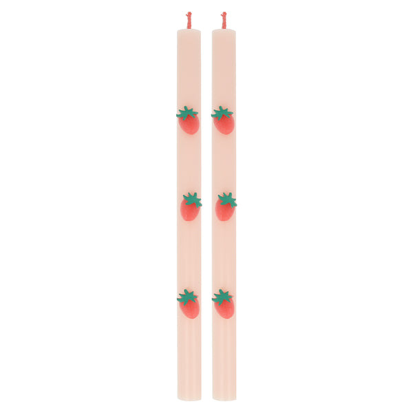 Our table candles, in a soft pink shade with wax strawberries and red wicks, are ideal as a host gift or a candle gift.