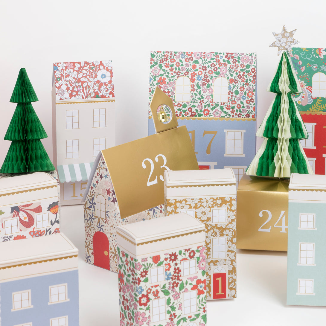 Our Christmas advent calendar creates a 3D village scene, with Liberty prints, shiny gold foil details and honeycomb trees, to fill with fun gifts. Image3