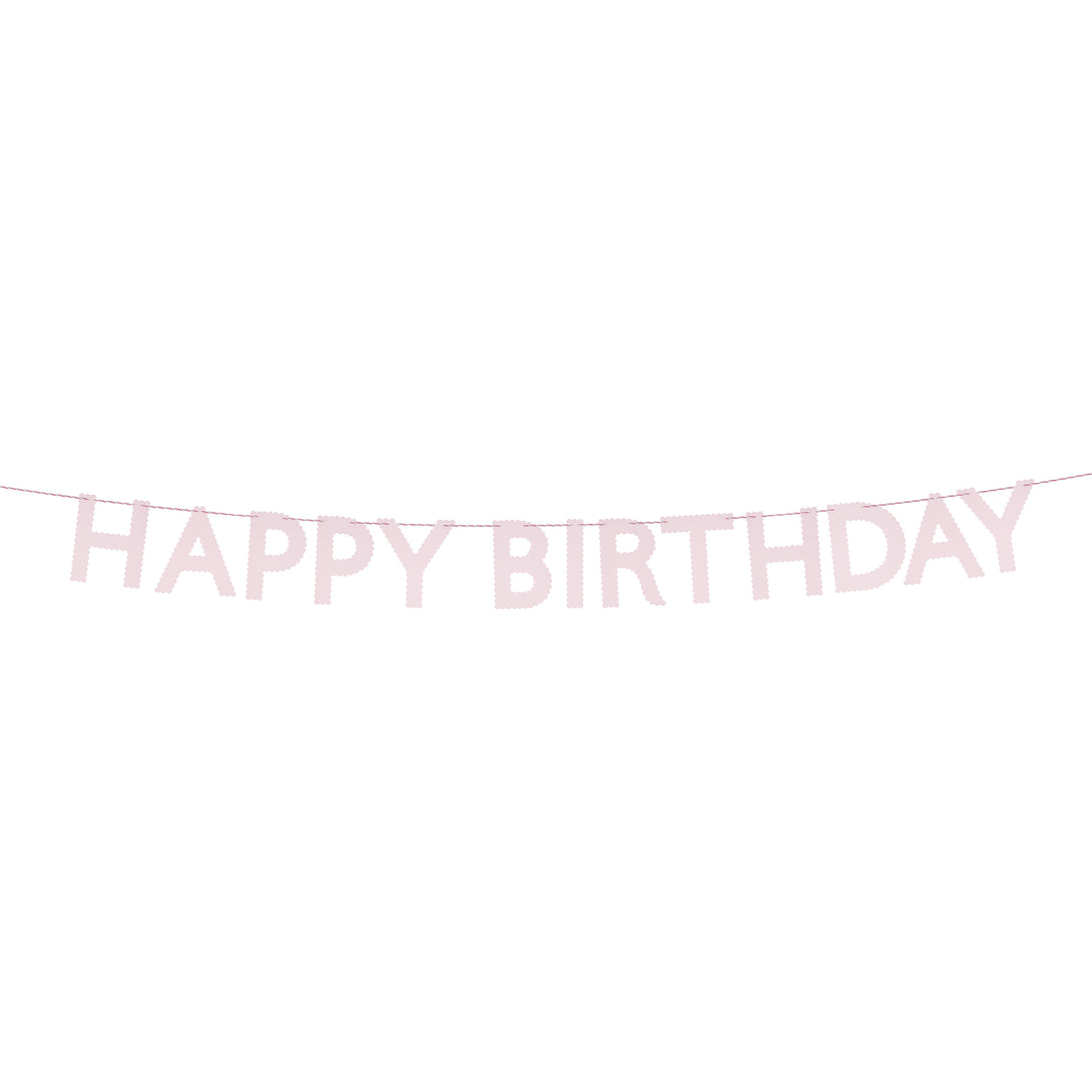 Our pink garland, made with scalloped pink paper, is a pretty decoration for a birthday party.