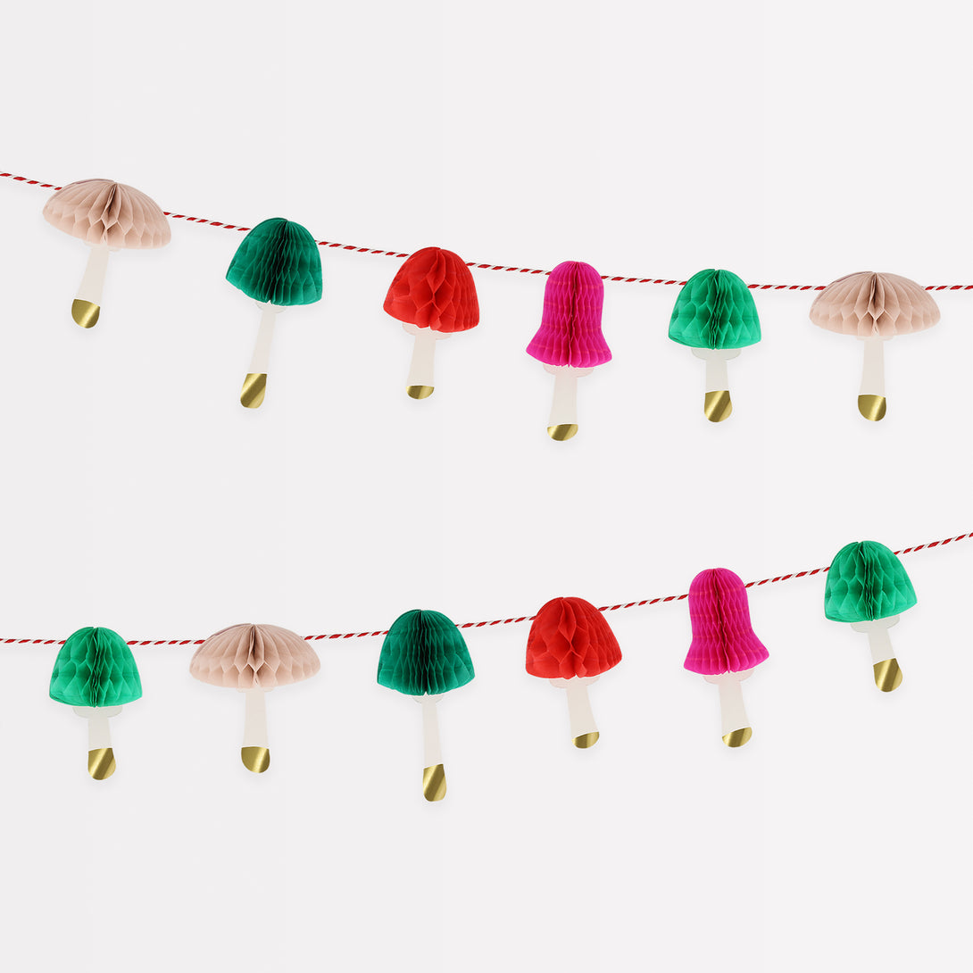 If you're looking for a Christmas wall decoration that's on trend then you'll love our mini paper garland with colorful mushrooms.