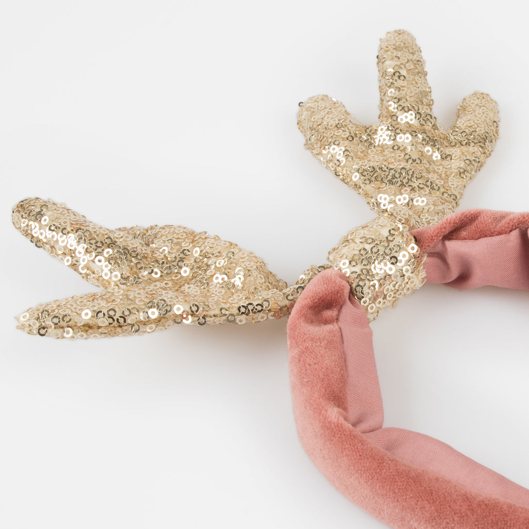 Make your Christmas hair look amazing with our antler headband, made with soft velvet and a sequinned gold fabric material.