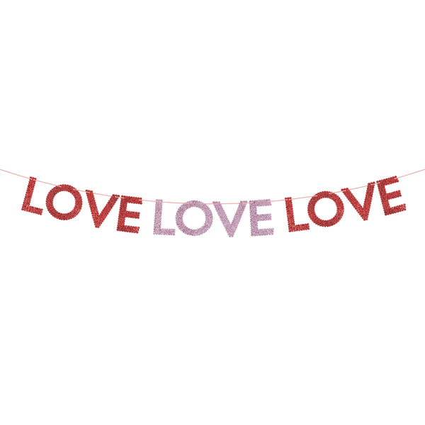 Our Valentine's Day garland features chunky pink and red glitter fabric letters to spell out the word love three times, vibrant and stylish. Image3