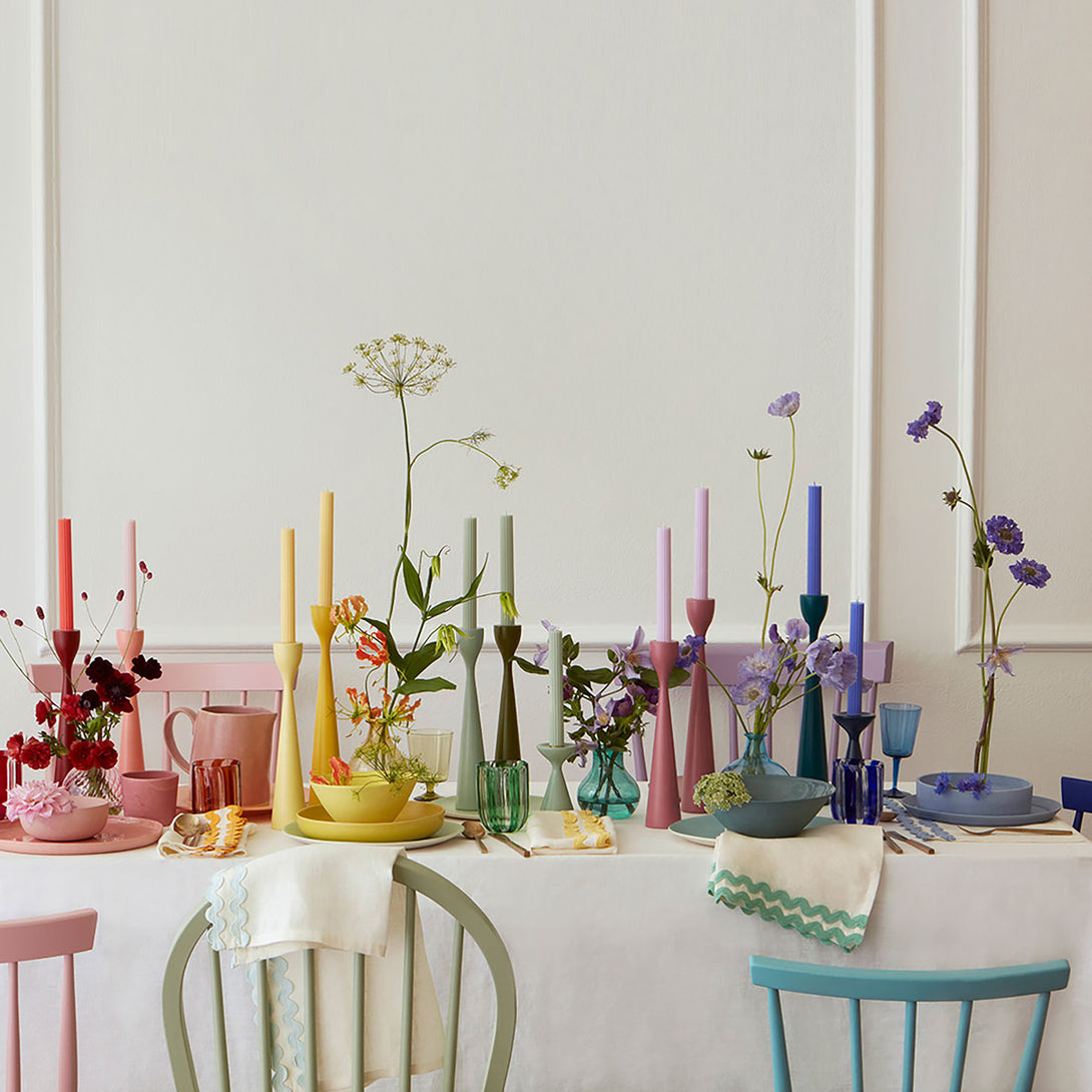 Our decorative candles in coral, pink, blue, sage and yellow will add color to your party table.