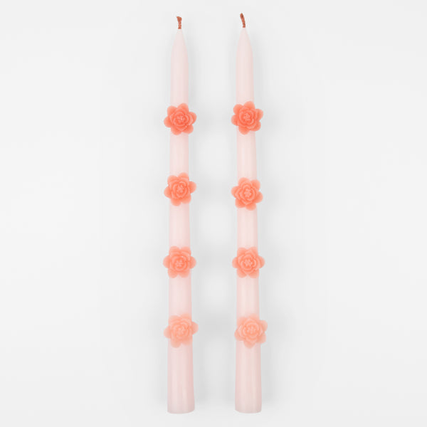 Make any pink party look amazing with our taper candles with pink flowers and pink wicks.