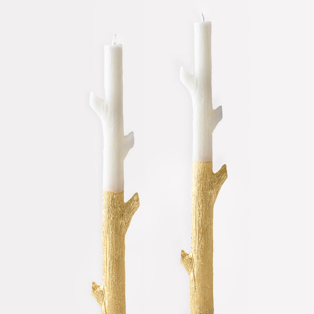 Our tall candles, in the shapes of sticks, are gold ink dipped for a really special effect - a fabulous host gift or Christmas table decoration.