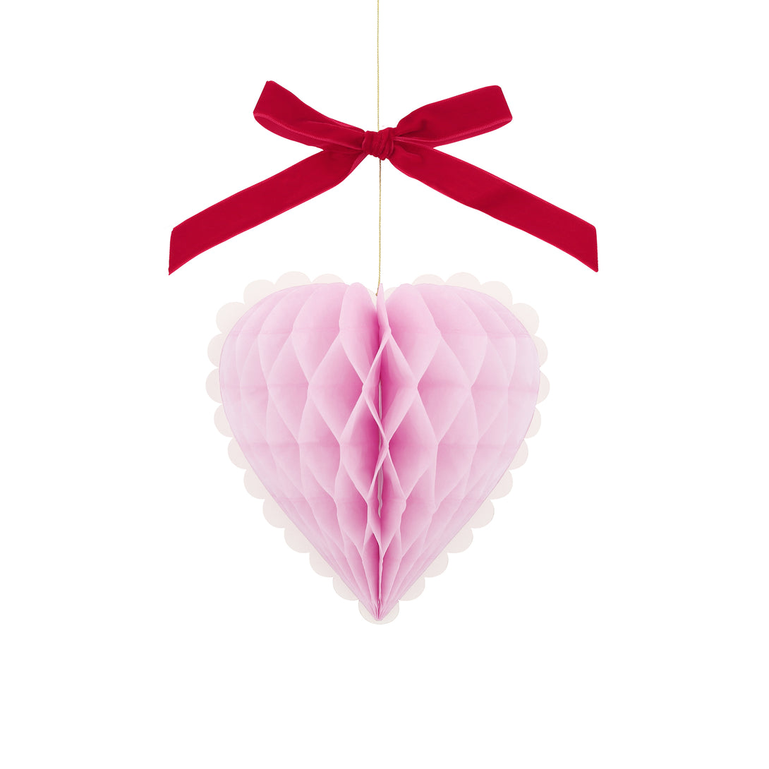 Our Valentine's hanging decorations, 3D honeycomb hearts in pink, red and cream with velvet ribbons, are perfect to set the scene for love