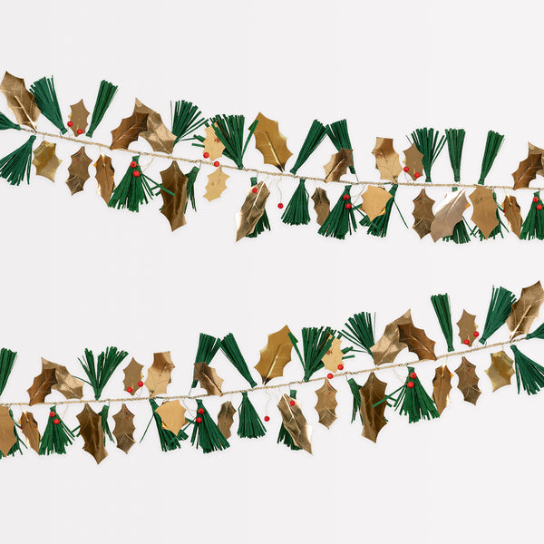 Our festive garland includes holly, berries and pine needles crafted from paper and wooden beads for a special Christmas foliage look.