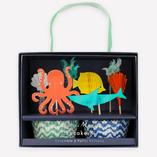 Our special under the sea set includes a stunning sea garland, plates, napkins, cupcake kit and 3D shark cups. Image8