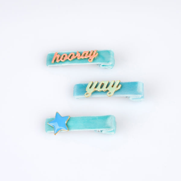 Our hair accessories for kids are charming birthday candle shaped clips with velvet ribbon and enamel details. Image5