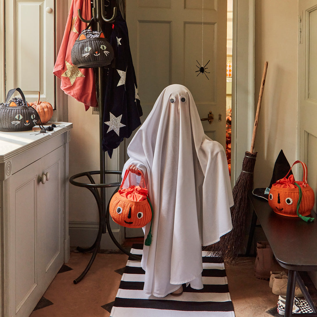 Our Halloween basket has a cute pumpkin face and fun tassels.