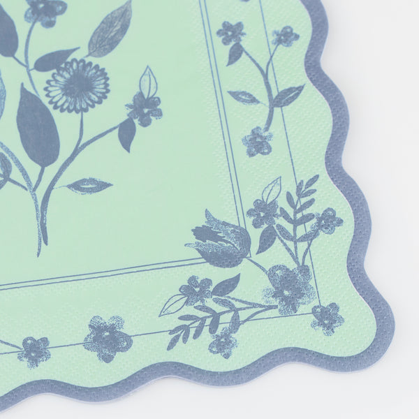 Our large party napkins, made from 3-ply paper, feature four pastel shades and cobalt blue botanical illustrations, ideal for any special meals. Image2