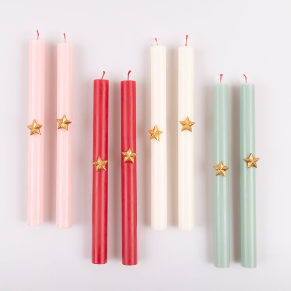 Our Christmas candle gift set features ridged candles with gold star embellishments, presented in a sparkly Liberty star print keepsake box Image3