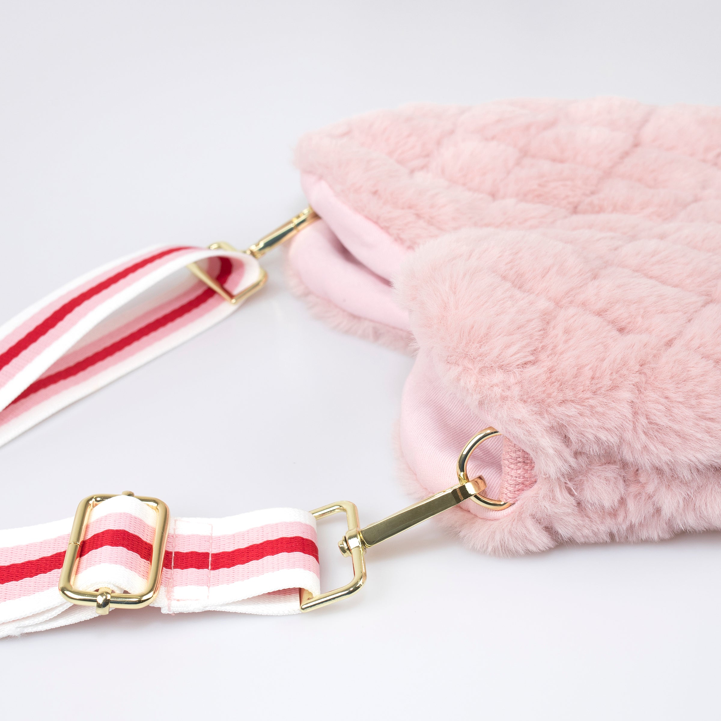 Our pink plush purse is perfect as a kids accessory.
