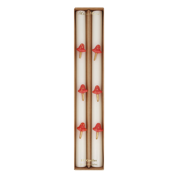 Our Christmas candles, with red and gold mushroom details, have fun red wicks and are perfect as Christmas table decorations. Image5