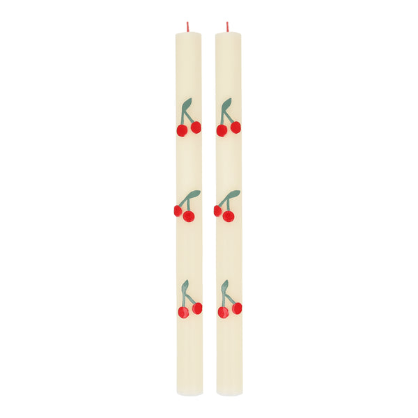 These table candles, with colored wicks and cherry details, are ideal as a host gift or when you're looking for decorative candles.