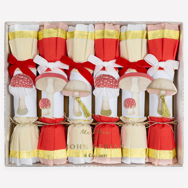 Our mushroom Christmas crackers feature an elegant mix of red, white, pink and gold with John Derian inspired mushroom embellishments. Image1