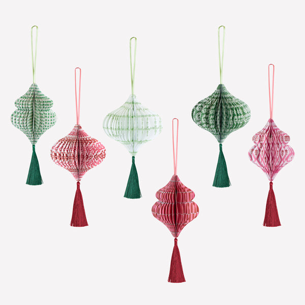 Our honeycomb Christmas tree decorations feature Molly Mahon block print designs in seasonal colors with shimmering tinsel tassels. Image1