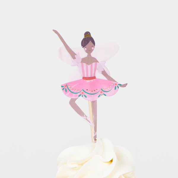 Our cupcake kit features classic Nutcracker character cake toppers and striped cupcake cases, ideal for Christmas treats. Image5