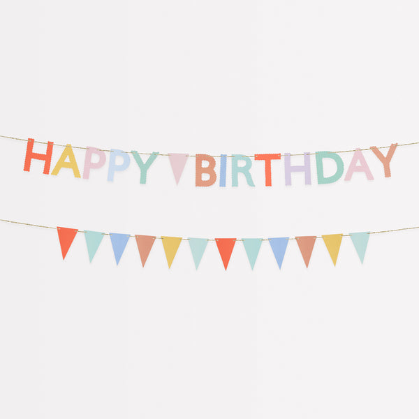 Our birthday garland set includes one that spells out Happy Birthday and another with flag pennants, in bright colors.