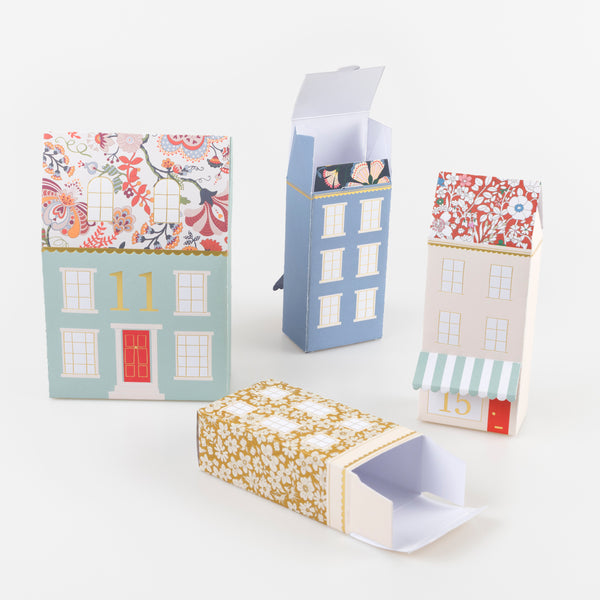 Our Christmas advent calendar creates a 3D village scene, with Liberty prints, shiny gold foil details and honeycomb trees, to fill with fun gifts. Image4