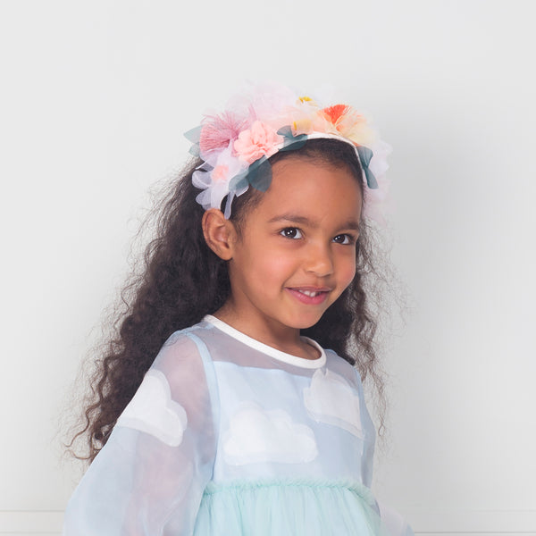 Our summery headband is embellished with organza flowers. Image3
