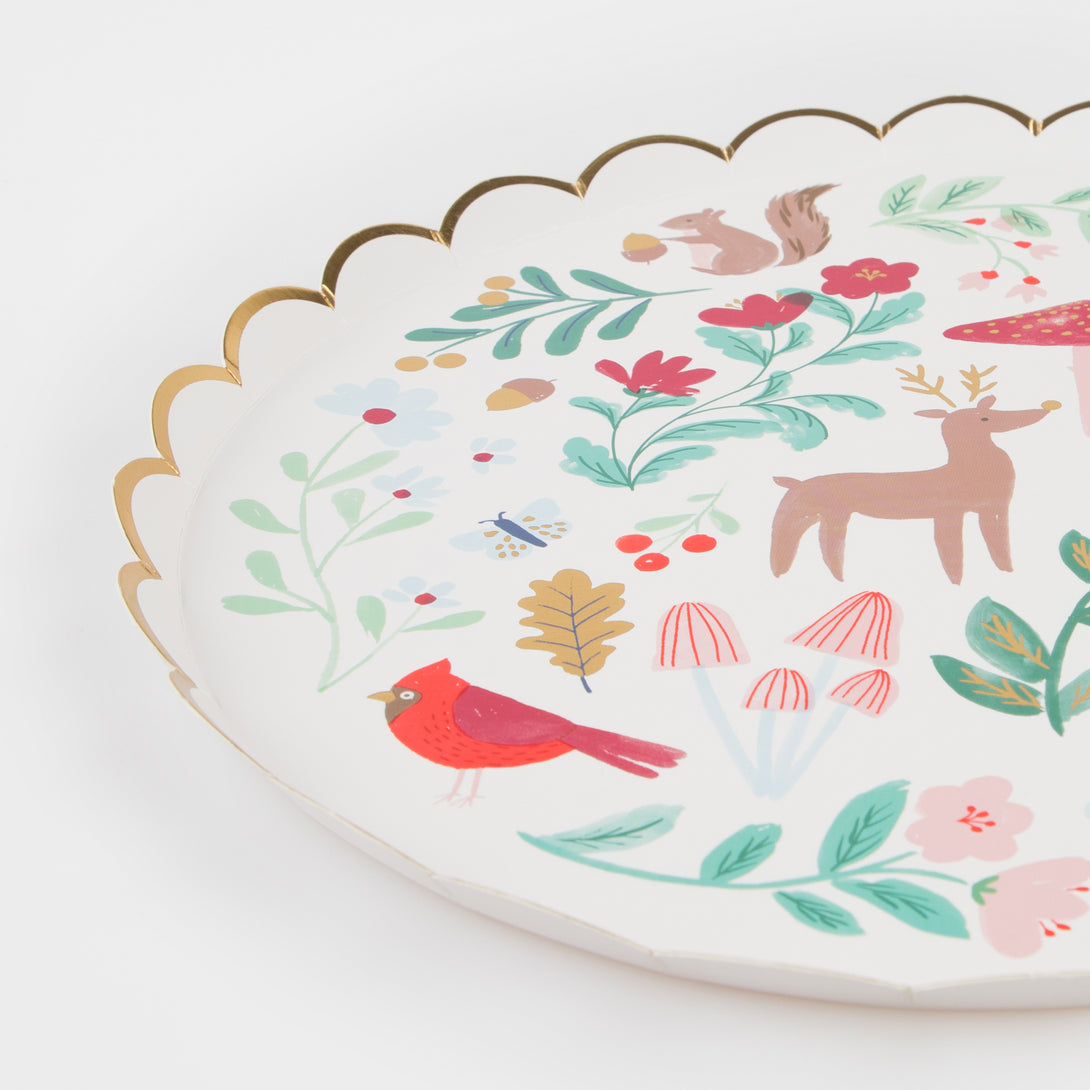 Our paper plates are perfect to add to your Christmas party supplies as they feature reindeer and flowers and lots of shiny gold foil.