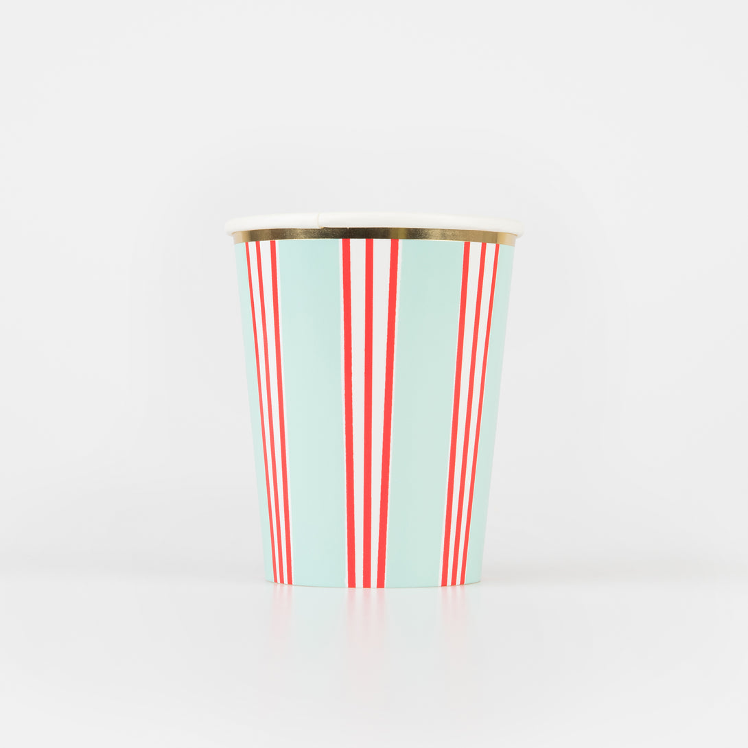 Our Christmas party set includes striped paper plates, cups and napkins, and a luxury velvet garland.