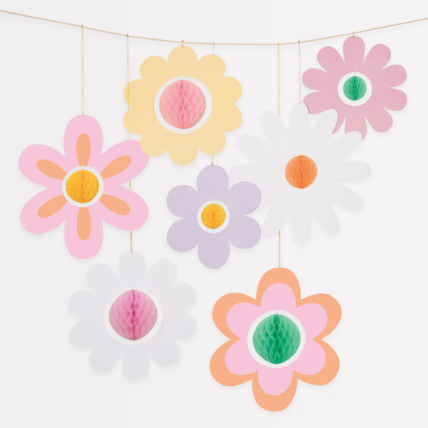 Our flower hanging decorations, with 3D honeycomb centers, are perfect for a pink party, groovy party or summer party