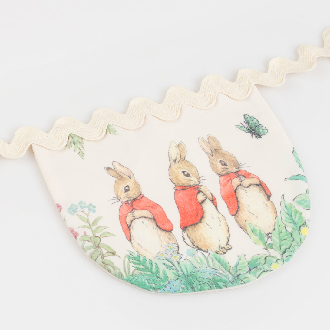 Our Peter Rabbit garland, crafted from fabric, is perfect as a baby shower garland or first birthday garland.