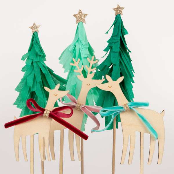 Our Christmas cake toppers, with wooden reindeer and paper Christmas trees will make your festive cakes look amazing. Image4