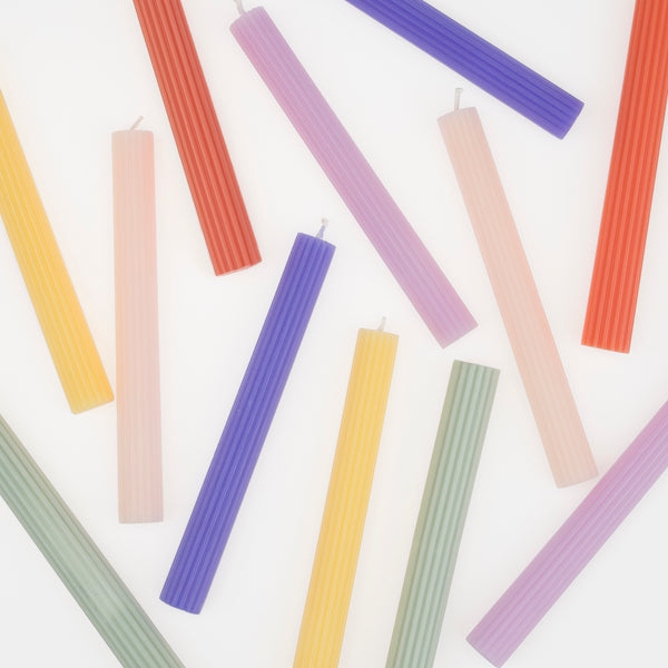 Our decorative candles in coral, pink, blue, sage and yellow will add color to your party table. Image5