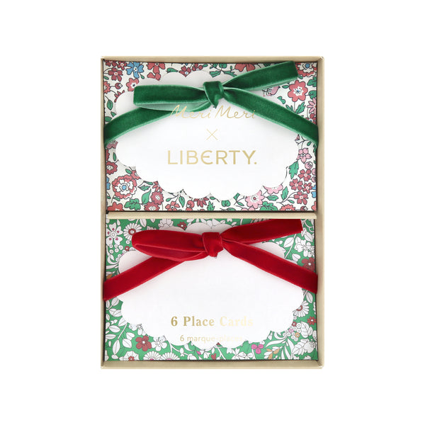 Our Christmas  place cards feature joyful Liberty prints, soft velvet bows, matte gold foil details and scalloped paper cards to write the names on. Image4