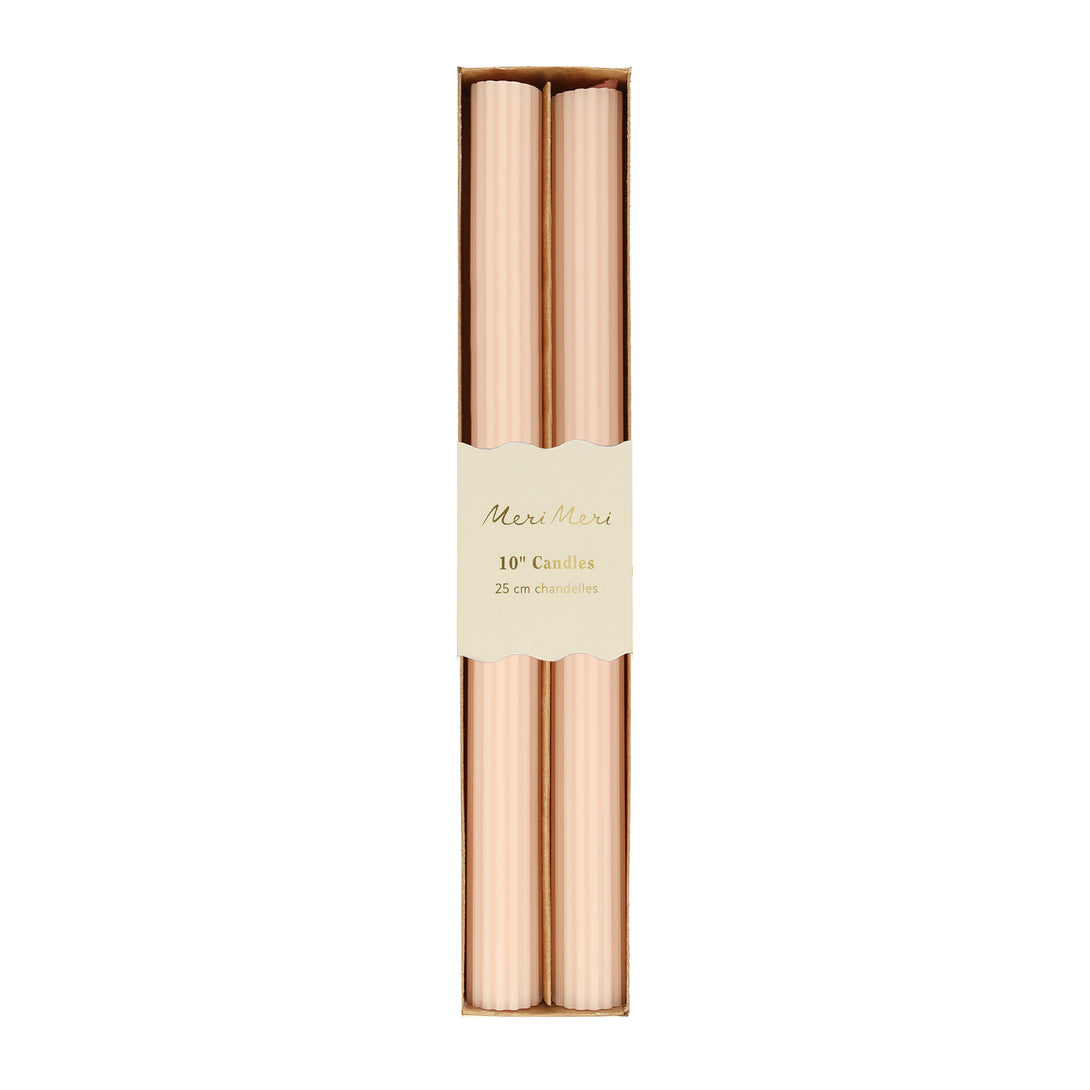 Decorate your table or mantel with our ridged long candles in a pretty peach pink shade.