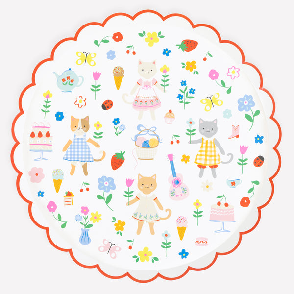 Our folk-inspired paper plates, in a large dinner plate size, feature charming kittens in a magical world, perfect for birthday parties. Image1