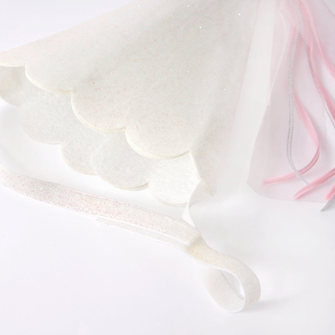 This costume, with a princess dress and hat with tassels, is perfect for a princess party. Image6