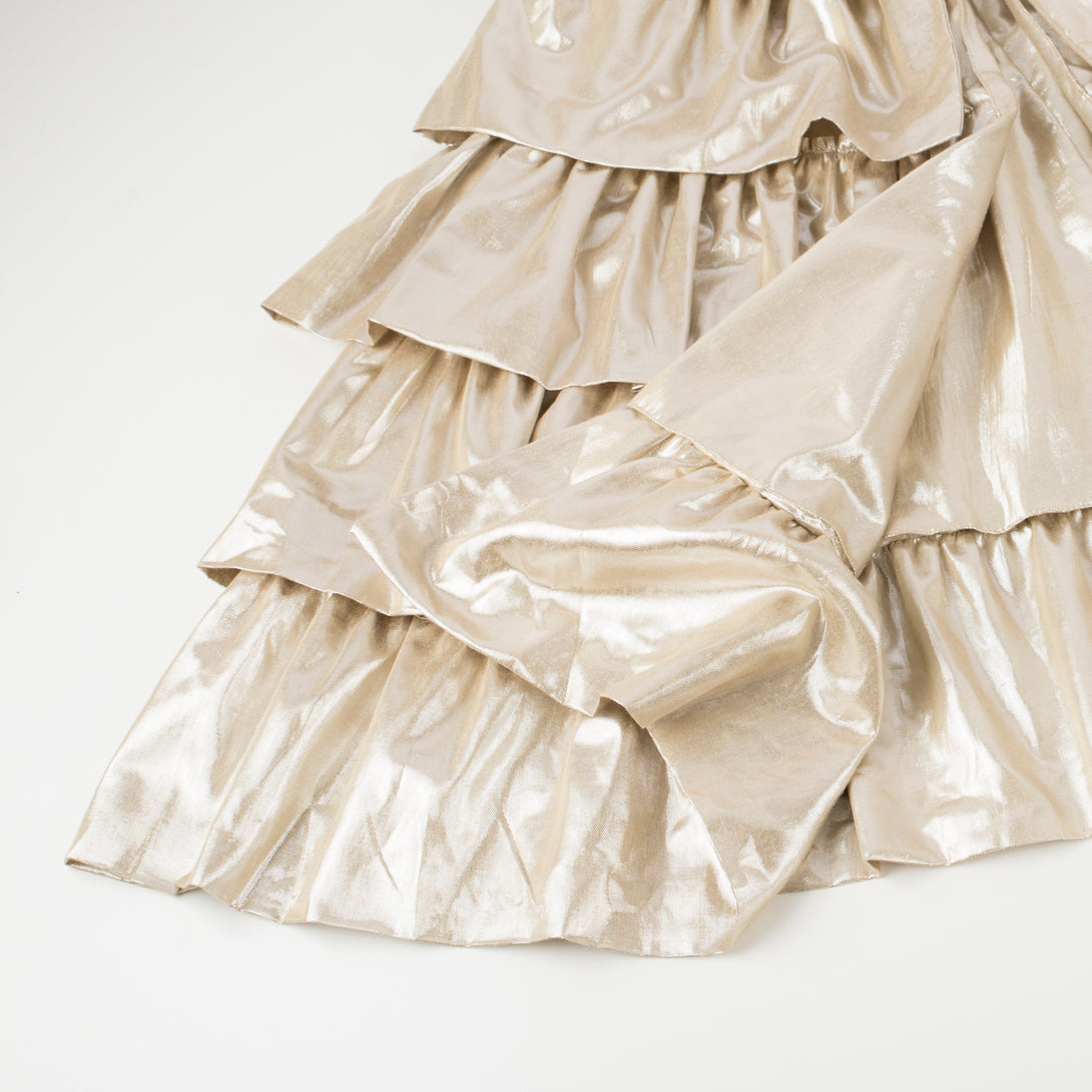 This gorgeous cape, crafted from gold lamé fabric, looks sensational. Image4