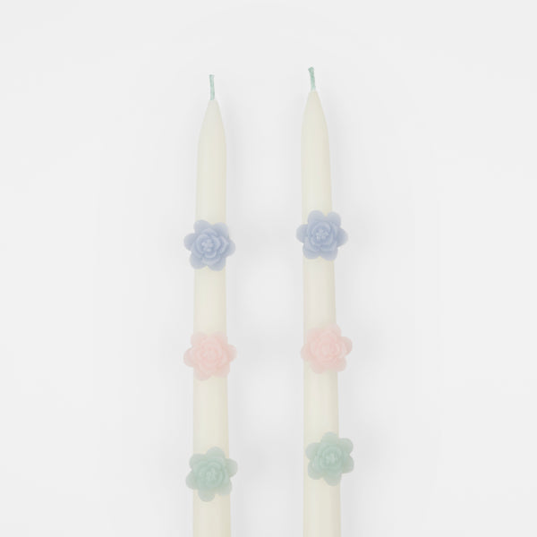 Our decorative candles are an elegant taper shape with 3D wax flowers. Image3