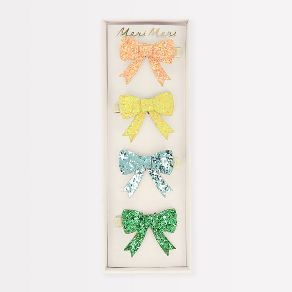 Our kids accessories range include glitter bow hair clips, perfect for a stylish look. Image5