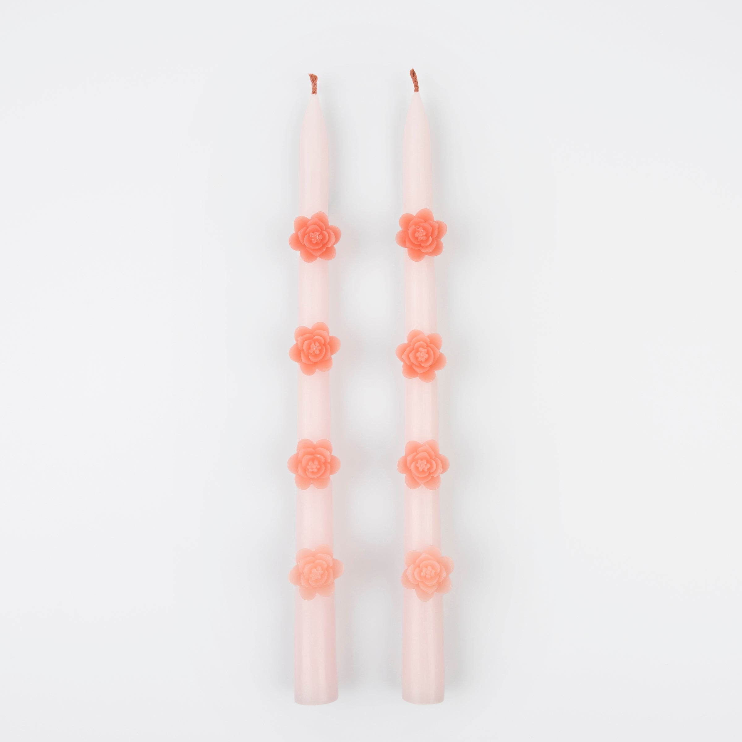 Make any pink party look amazing with our taper candles with pink flowers and pink wicks.