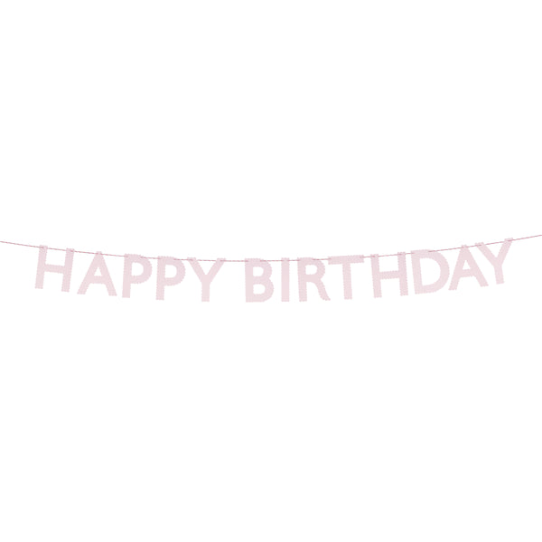 Our pink garland, made with scalloped pink paper, is a pretty decoration for a birthday party. Image2