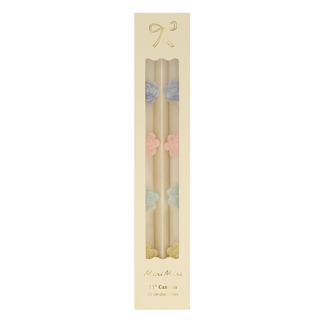 Our decorative candles are an elegant taper shape with 3D wax flowers.