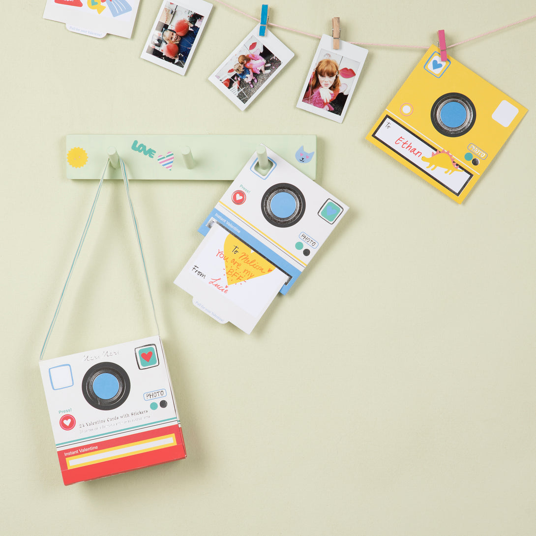 Our kids Valentines cards are designed to look like a camera and also include Valentines stickers, a fabulous Valentines gift.