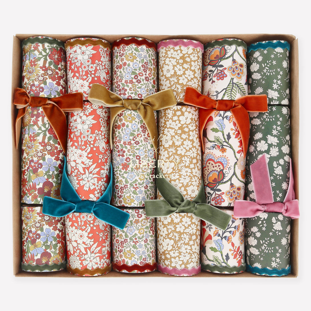 Our Thanksgiving party crackers feature Liberty floral prints, velvet bows and ric rac, containing a wooden brooch or keyring, party hat and joke. Image1