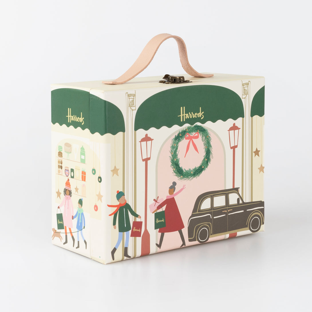 Our iconic Harrods mini suitcase includes an advent calendar where you'll get to create a charm bracelet over 24 days.