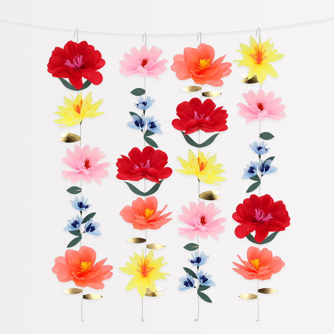 Use our bright flower wall, made with bright tissue paper flowers, to add color and charm to any party or as a floral home decoration.