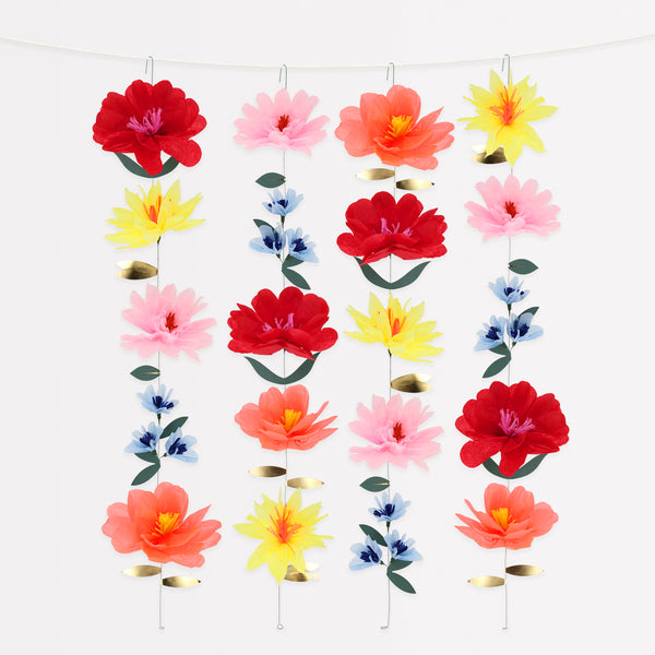 Use our bright flower wall, made with bright tissue paper flowers, to add color and charm to any party or as a floral home decoration.