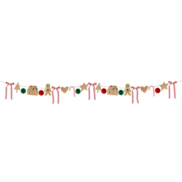 Our Christmas garland, featuring gingerbread and bows, is perfect for a mix of nostalgia and on-trend decoration. Image2