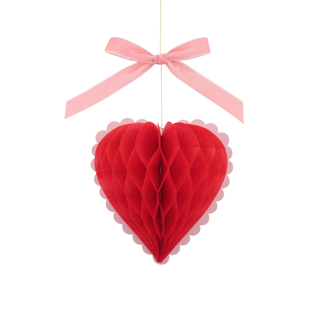 Our Valentine's hanging decorations, 3D honeycomb hearts in pink, red and cream with velvet ribbons, are perfect to set the scene for love