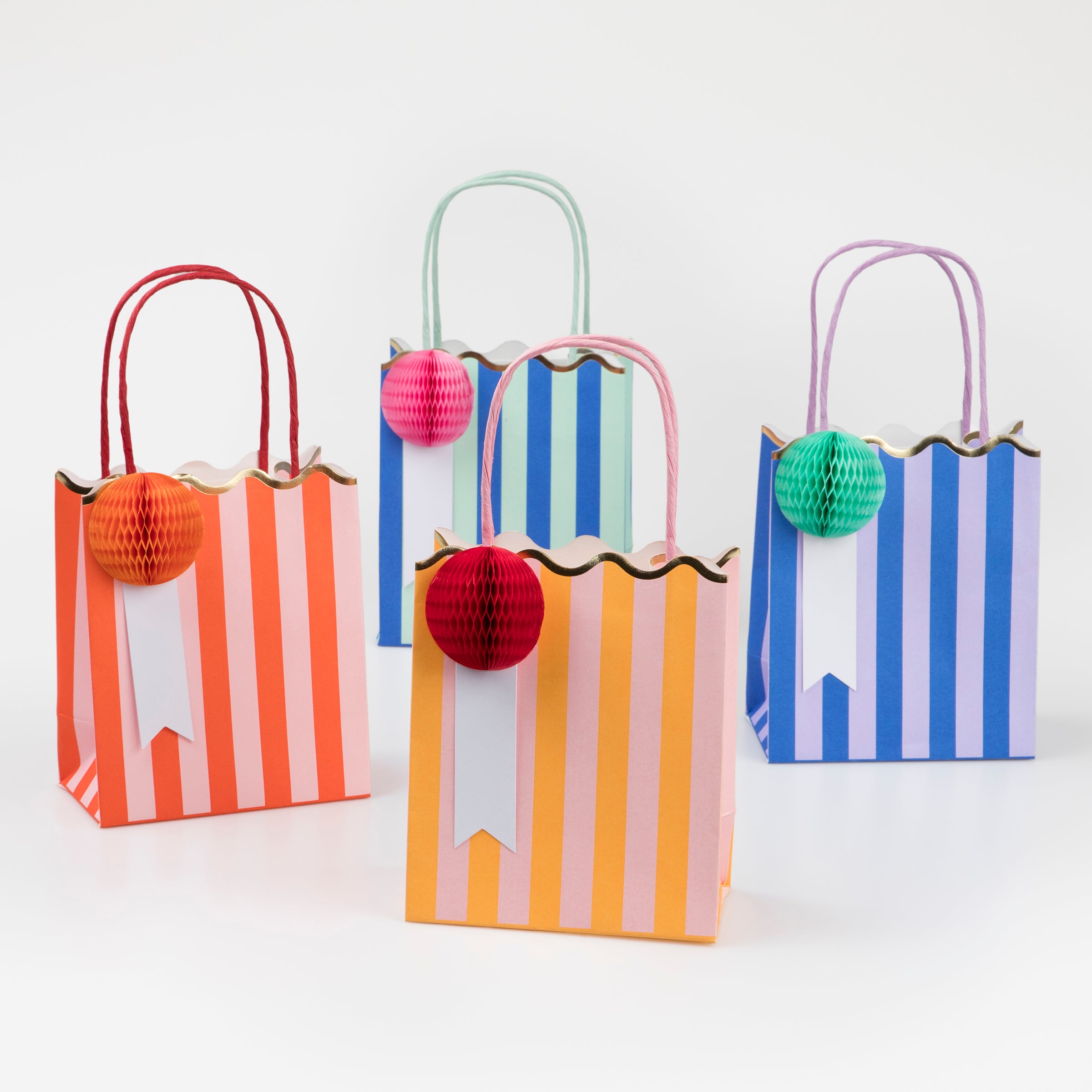 Choose our bright and striped party bags to thrill your party guests.