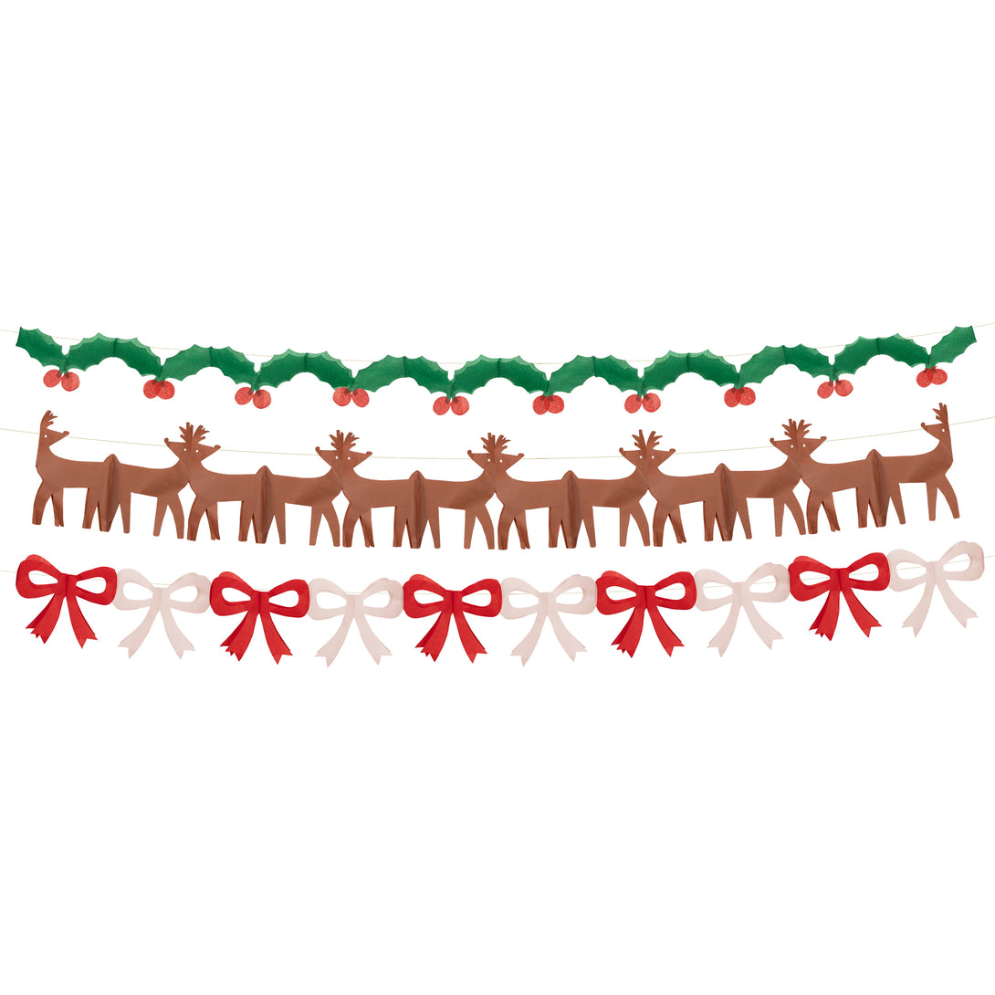 Our classic Christmas garlands, featuring reindeer, bows and holly and berries, are made with colorful tissue paper.